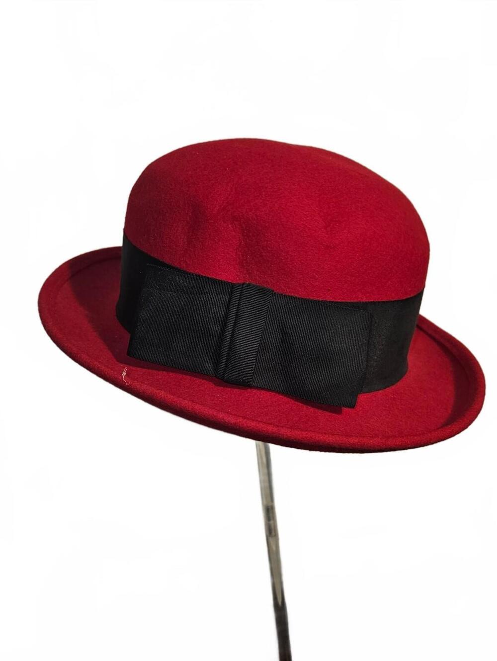 Red Importina bowler hat with black band